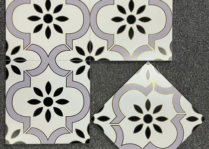 Chất liệu gạch bông khắc vàng kim là đá granite siêu bền, bề mặt ánh nhũ vàng, khó phai màu