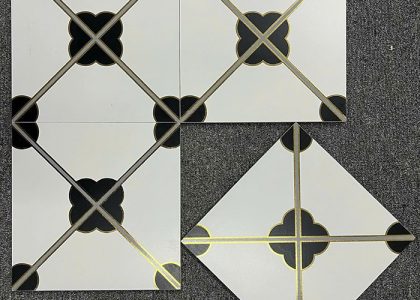 Chất liệu gạch bông khắc vàng kim là đá granite siêu bền, bề mặt ánh nhũ vàng, khó phai màu