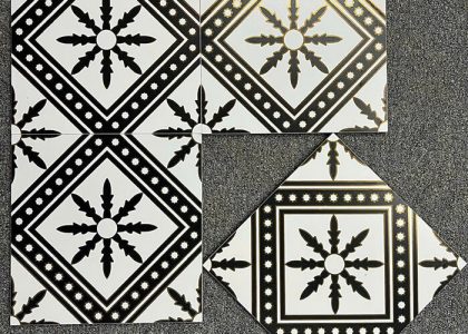 Chất liệu gạch bông khắc vàng kim là đá granite siêu bền, bề mặt ánh nhũ vàng, khó phai màu
